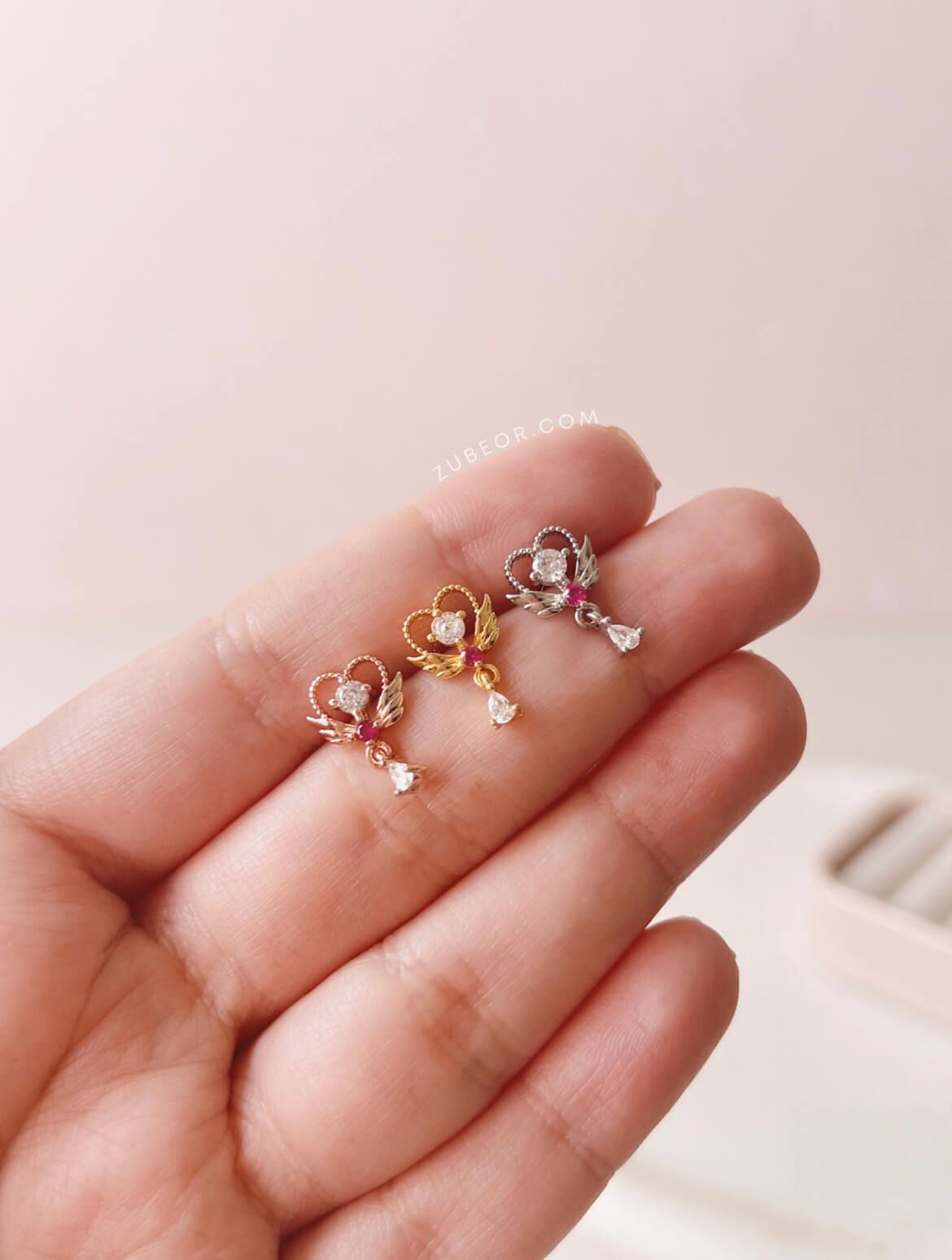 Piercing corazón alas 2