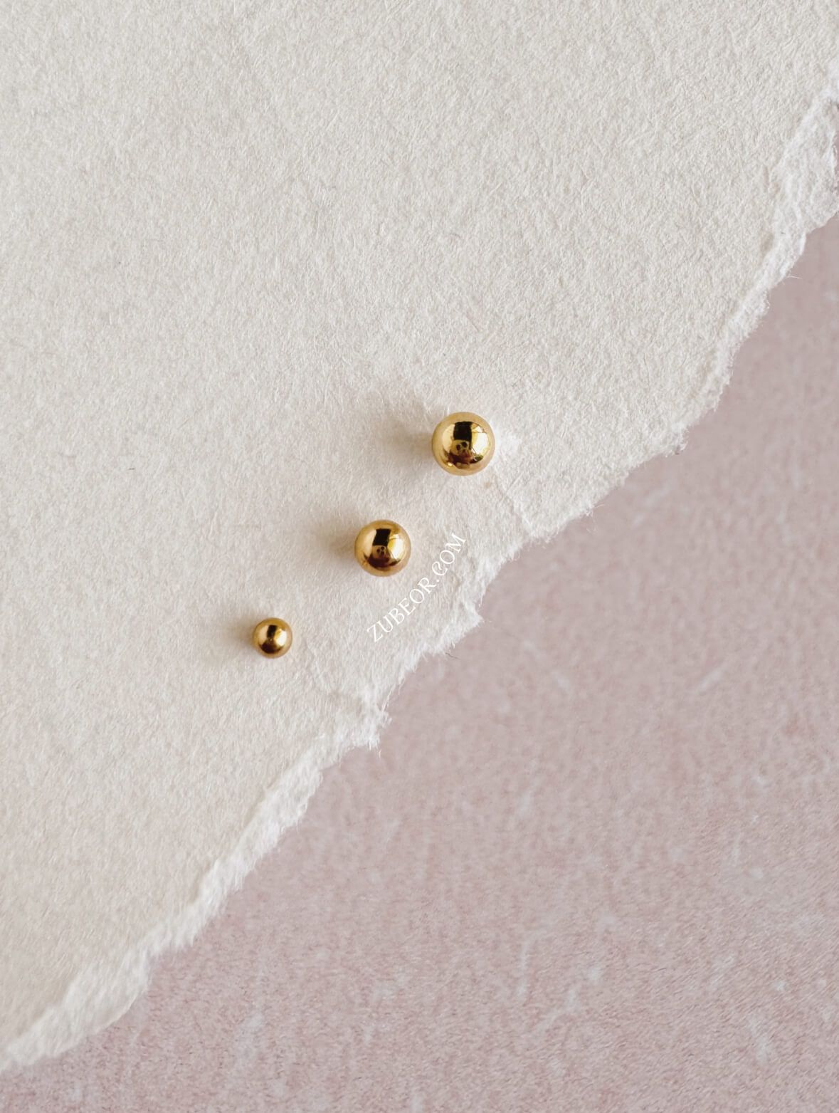 Piercing doble esfera