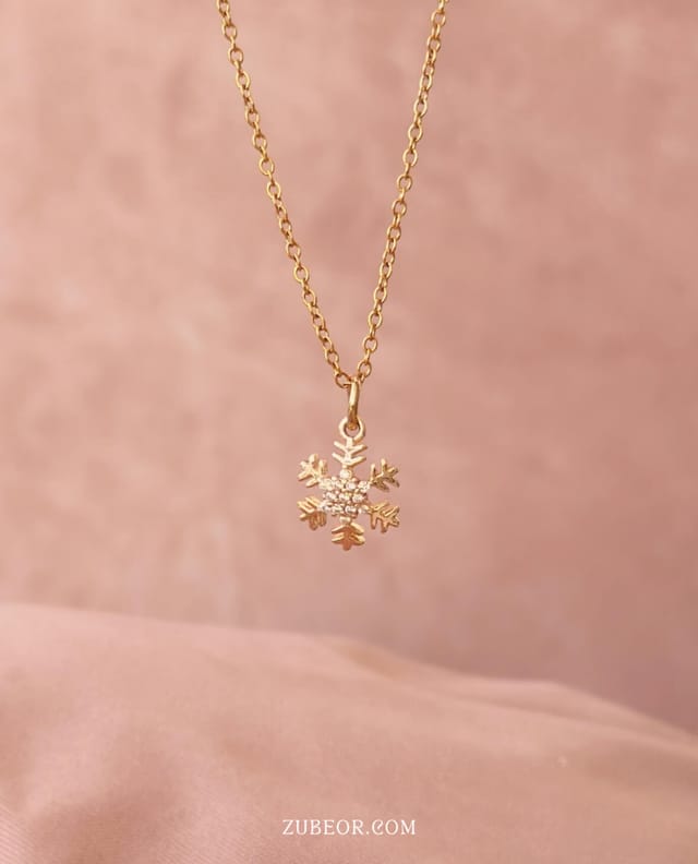 Cadena copo de nieve dorado