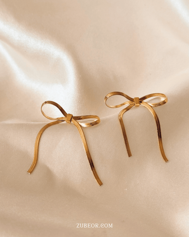 Aretes moño dorado